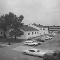 Gymnasium with Life Sciences Building under construction in background